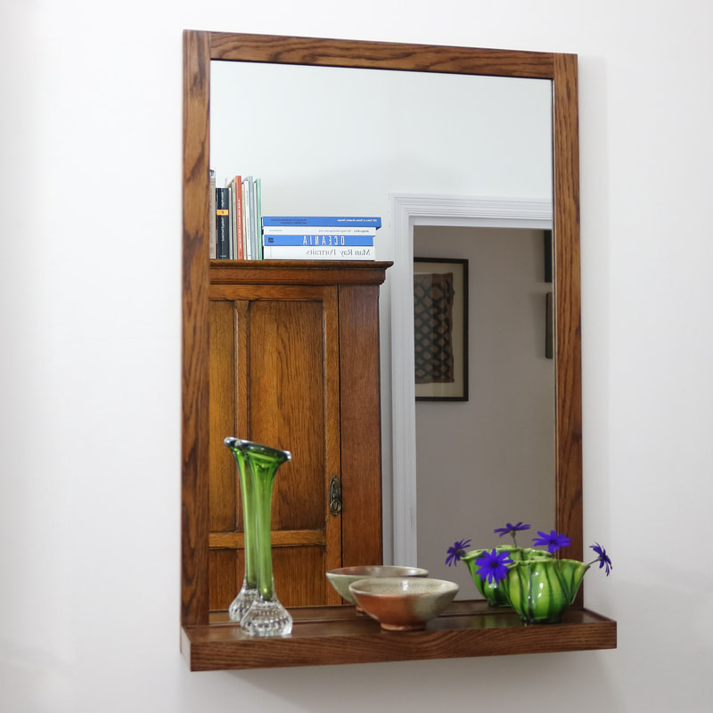 Bespoke oak shelf mirror for a London bedroom