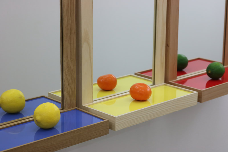 Three blue, yellow and red Shelf Mirrors in oak, ash and beech